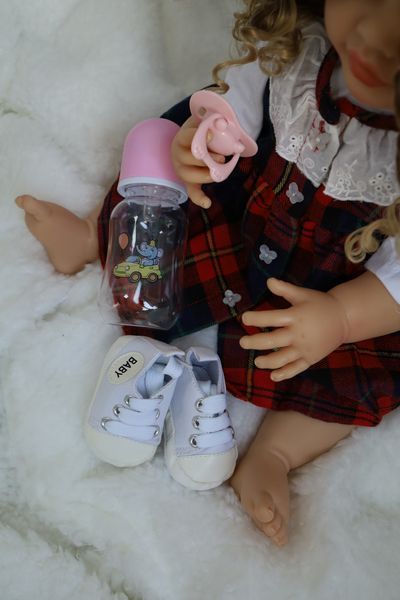 Реалістична лялька Реборн Reborn Doll 55 см, вініл-силіконова дівчинка кучеряшка в одязі з аксесуарами DO-27 фото
