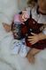 Реалістична лялька Реборн Reborn Doll 55 см, вініл-силіконова дівчинка кучеряшка в одязі з аксесуарами DO-27 фото 8