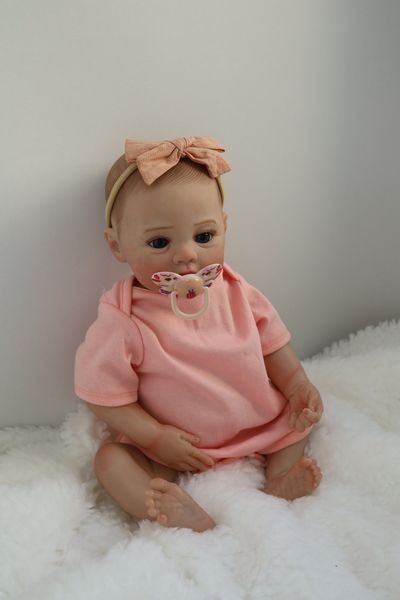 Лялька Реборн Reborn Doll 50 см, реалістична вініл-силіконова дівчинка пупс в рожевому одязі+аксесуари DO-34 фото