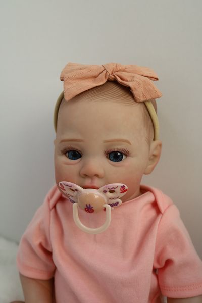 Лялька Реборн Reborn Doll 50 см, реалістична вініл-силіконова дівчинка пупс в рожевому одязі+аксесуари DO-34 фото